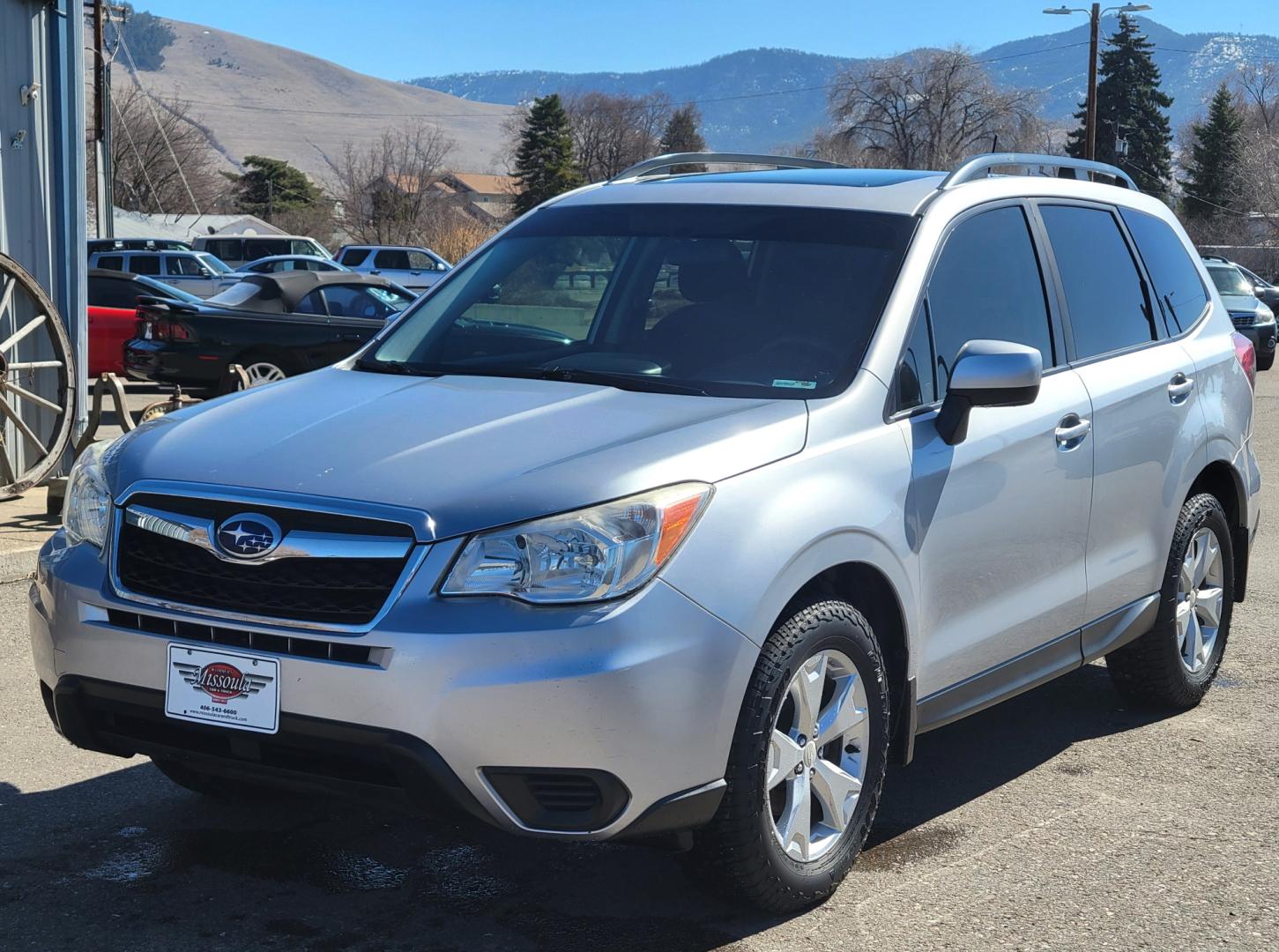 2015 Silver /Black Subaru Forester Premium (JF2SJADC3FH) with an 2.5L H4 engine, Automatic transmission, located at 450 N Russell, Missoula, MT, 59801, (406) 543-6600, 46.874496, -114.017433 - Photo#1